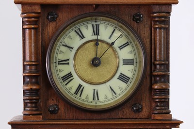 Lot 434 - An oak waterfall clock