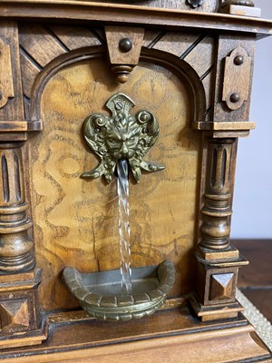 Lot 434 - An oak waterfall clock