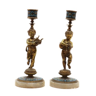 Lot 339 - A pair of gilt bronze and champleve enamel candlesticks