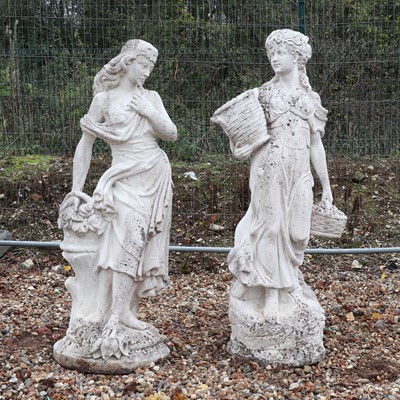Lot 643 - A pair of composite stone garden statues