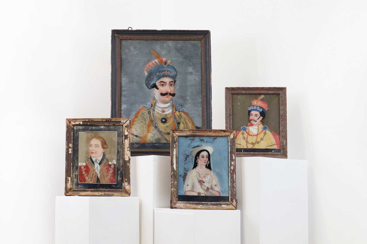 Lot 96 - Four reverse painted glass portraits,