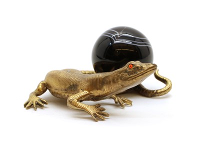 Lot 490 - A gold-plated paperweight