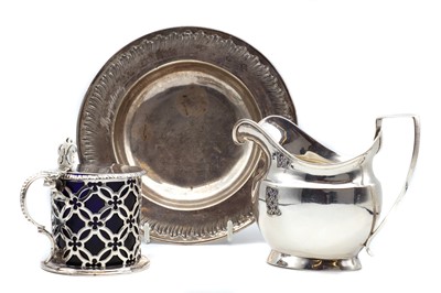 Lot 11 - A George III silver cream jug