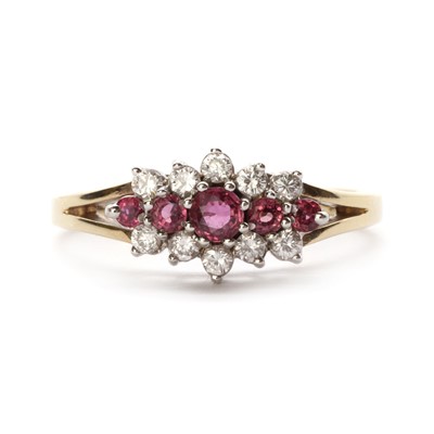 Lot 1192 - A 9ct gold ruby and diamond cluster ring