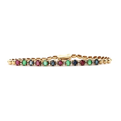 Lot 1207 - A gold assorted gemstone bracelet