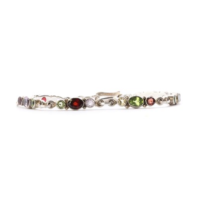 Lot 1209 - A silver assorted gemstone bracelet