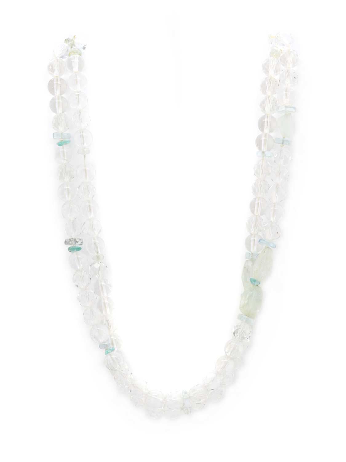 Lot 1261 - A two row aquamarine and quartz bead necklace, by Avrina Eggleston