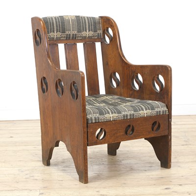 Lot 62 - An Arts and Crafts oak armchair