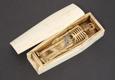 Lot 391 - A carved bone casket