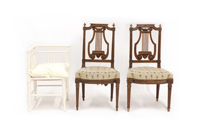 Lot 637 - A pair of fruitwood side chairs