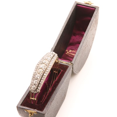 Lot 62 - A Continental style diamond set hinged bangle, c.1890