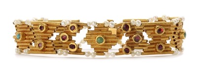 Lot 1204 - A gold assorted gemstone bracelet