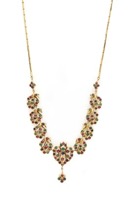 Lot 84 - A gold synthetic gem set necklace