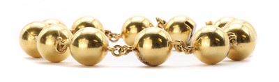 Lot 1109 - A French gold bead bracelet