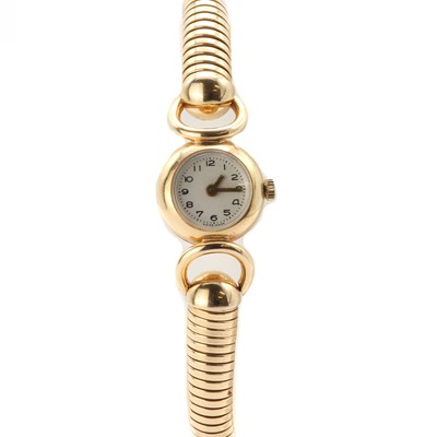 Lot 1414 - A French gold mechanical bracelet watch