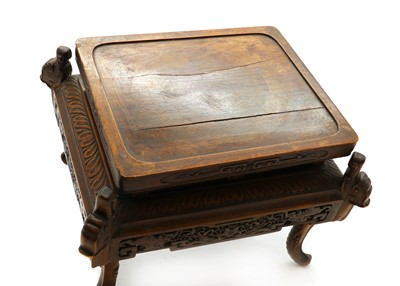 Lot 312 - A Chinese hardwood jardiniere stand