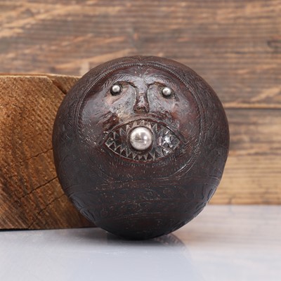 Lot 199 - A carved 'bugbear' coconut flask
