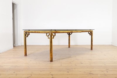 Lot 192 - A chinoiserie brass dining table