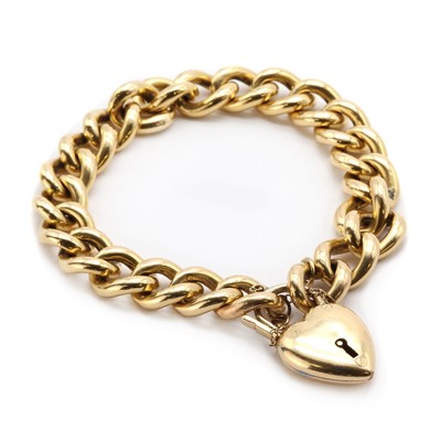 Lot 1055 - A gold hollow curb link bracelet