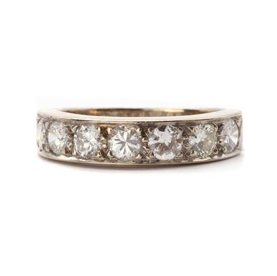 Lot 67 - A white gold diamond half eternity ring