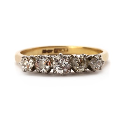 Lot 1131 - A gold five stone diamond ring