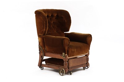 Lot 594 - A Victorian metamorphic wing armchair