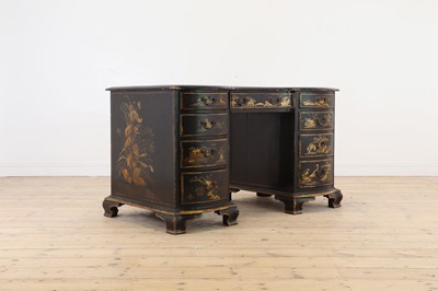 Lot 260 - A George II-style black-lacquered twin pedestal desk