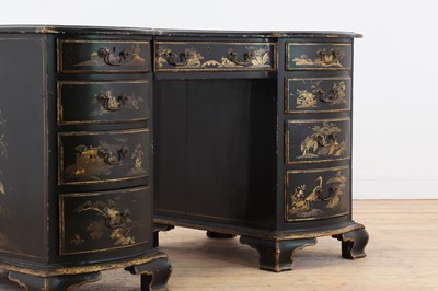 Lot 260 - A George II-style black-lacquered twin pedestal desk
