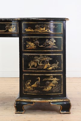 Lot 260 - A George II-style black-lacquered twin pedestal desk