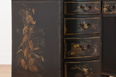 Lot 260 - A George II-style black-lacquered twin pedestal desk