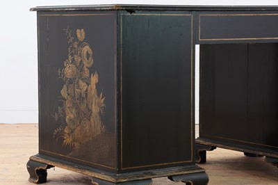 Lot 260 - A George II-style black-lacquered twin pedestal desk