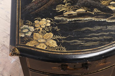 Lot 260 - A George II-style black-lacquered twin pedestal desk