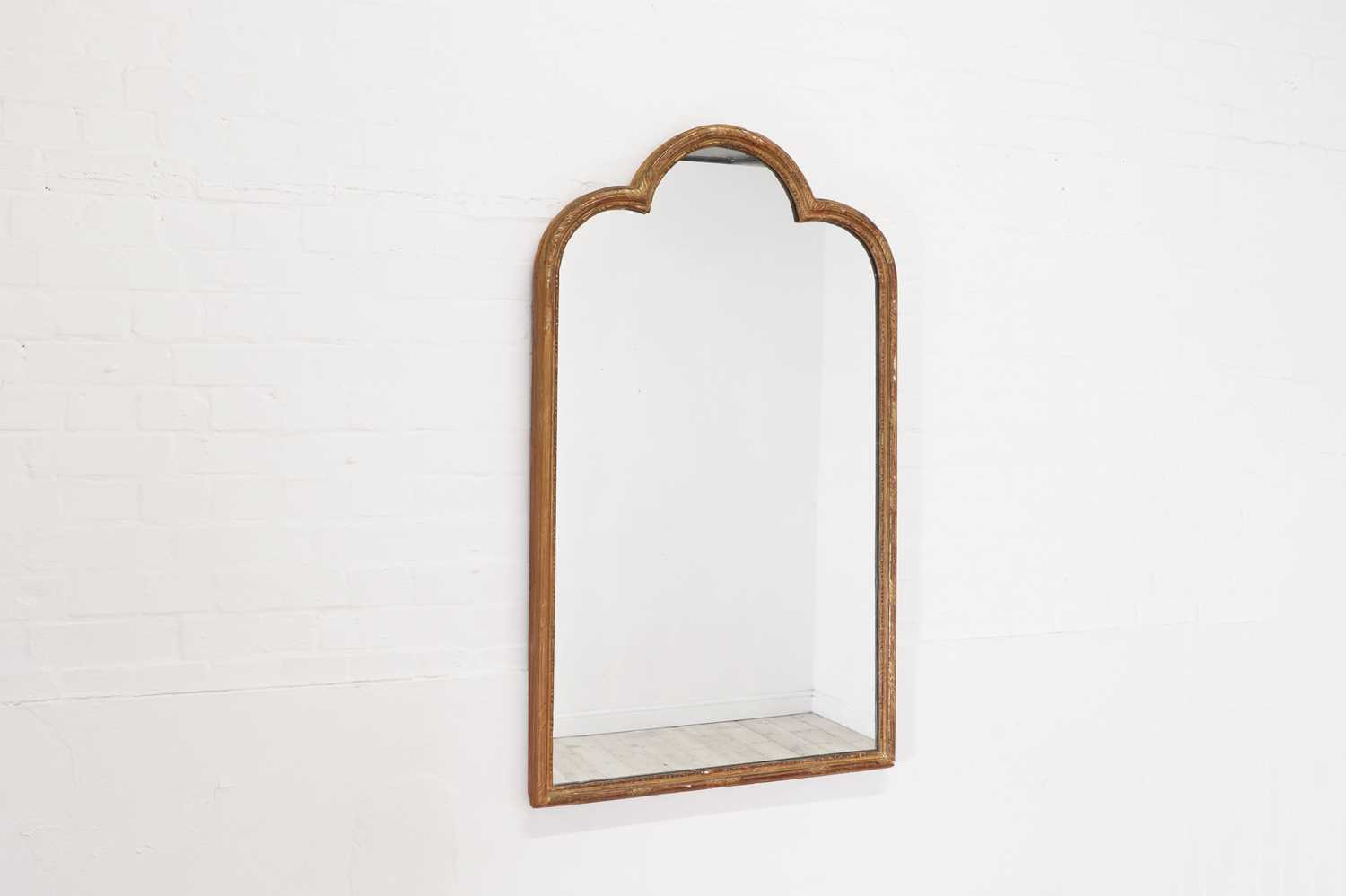 Lot 276 - A Queen Anne-style giltwood mirror