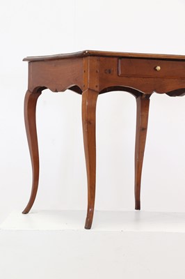 Lot 297 - A provincial fruitwood centre table