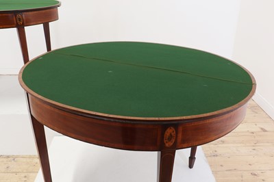 Lot 246 - A pair of George III mahogany card tables