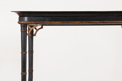 Lot 274 - Two ebonised tray-top side tables