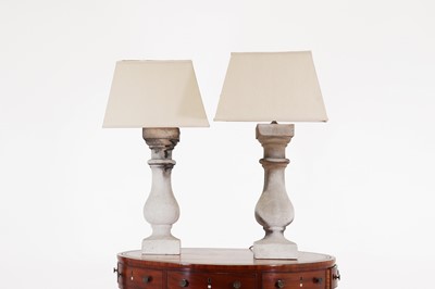 Lot 282 - A pair of composition stone baluster table lamps