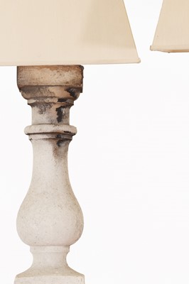 Lot 282 - A pair of composition stone baluster table lamps