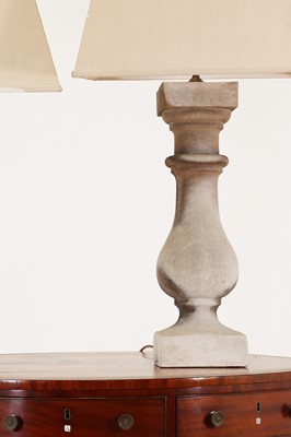 Lot 282 - A pair of composition stone baluster table lamps