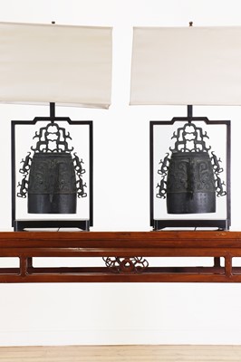 Lot 255 - A pair of archaistic patinated bronze zhong bell lamps