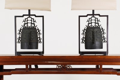 Lot 255 - A pair of archaistic patinated bronze zhong bell lamps
