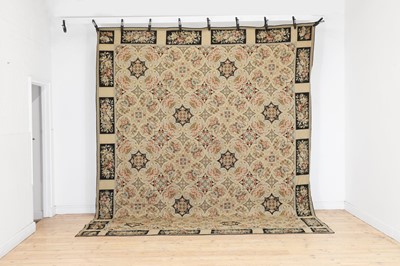 Lot 440 - A large needlepoint carpet