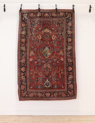 Lot 516 - A Kashan wool rug