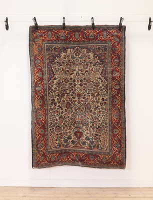 Lot 517 - A Kashan wool rug