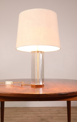 Lot 514 - A Lucite and brass table lamp