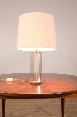 Lot 514 - A Lucite and brass table lamp