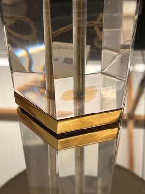 Lot 514 - A Lucite and brass table lamp
