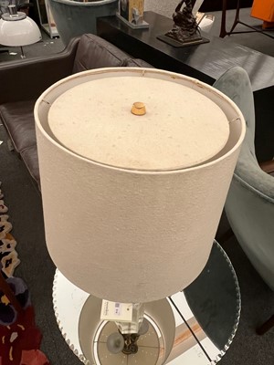 Lot 514 - A Lucite and brass table lamp
