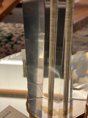 Lot 514 - A Lucite and brass table lamp