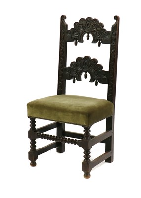 Lot 452 - A Charles II style Derbyshire oak bar back chair